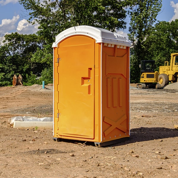 how often are the portable restrooms cleaned and serviced during a rental period in Bland